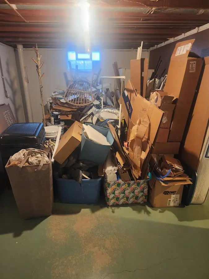 Roll-off dumpster container at job site for Construction Dumpster Rental in Bethel Manor